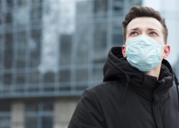 man with medical mask posing city with copy space 23 2148445026