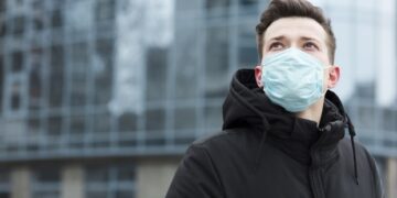 man with medical mask posing city with copy space 23 2148445026